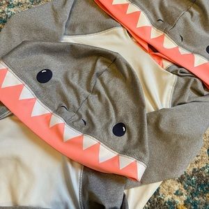 4T & 2T swimsuit top . In a shark shape .